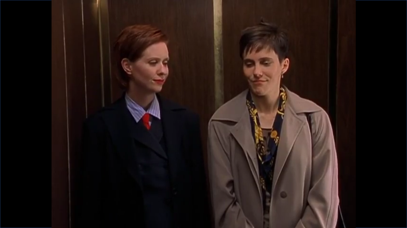 A screenshot from the episode with Miranda and Syd in the elevator